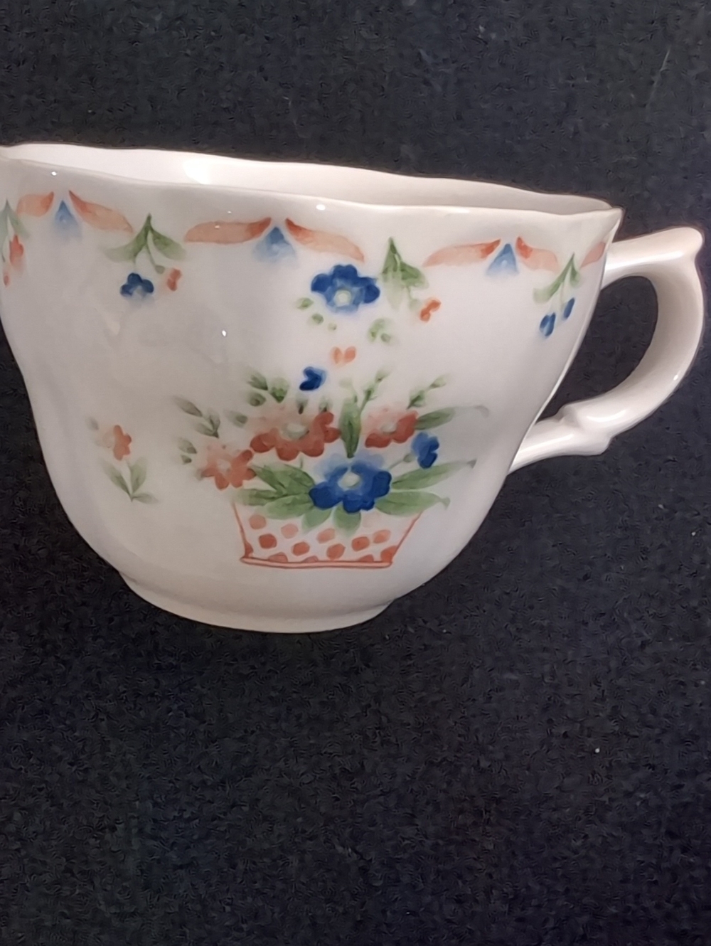 White Floral Porcelain Teacup with Blue and Coral Flowers
